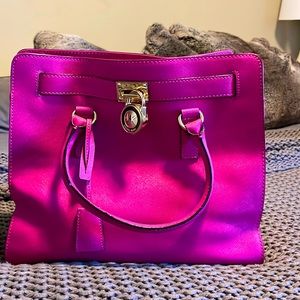 Michael Kors fuchsia pink Hamilton bag with gold hardware.